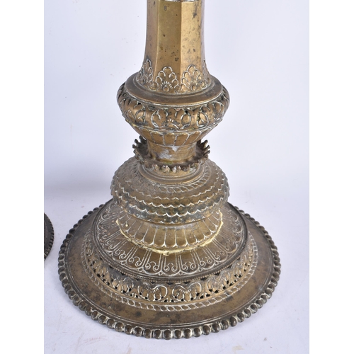 969 - Two Antique Arabic Middle Eastern Islamic Bedouin Candlesticks.  Largest 52cm x 21.5cm