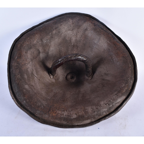 985 - An Ethnographic, Tribal, African Elephant Hide Shield.  42cm diameter