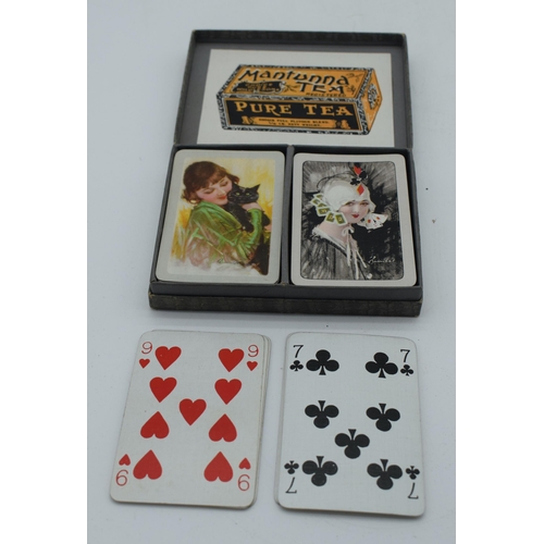 1005 - A BOXED COLLECTION OF VINTAGE PLAYING CARDS. 13 cm x 10 cm. (qty)