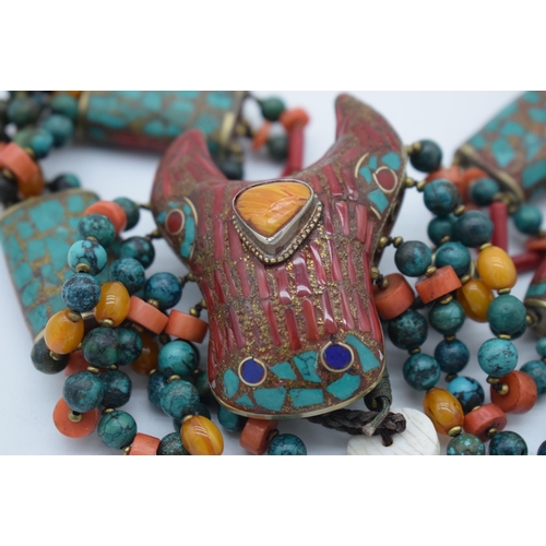 1016 - AN UNUSUAL TIBETAN TURQUOISE AMBER AND CORAL NECKLACE. 131 grams. 54 cm long.