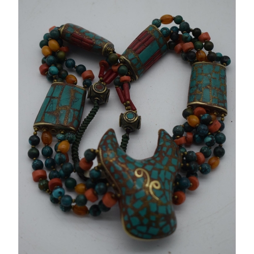 1016 - AN UNUSUAL TIBETAN TURQUOISE AMBER AND CORAL NECKLACE. 131 grams. 54 cm long.