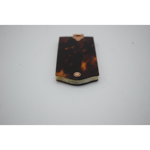 1020 - AN EARLY VICTORIAN TORTOISESHELL DAYS OF THE WEEK POCKET BOOK. 29 grams. 7.5 cm x 3.5 cm.