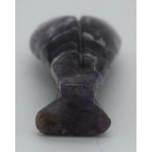 1021 - A CARVED AMETHYST STONE ANGEL. 95 grams. 7.5 cm x 4.25cm.