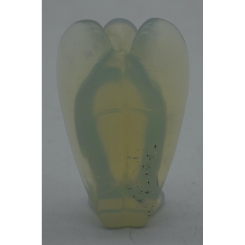 1022 - A CARVED OPAL GLASS ANGEL. 100 grams. 7.5 cm x 4.5 cm.