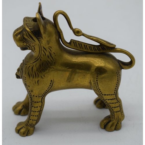 1024 - AN EARLY BRONZE AQUAMANILE BEAST. 228 grams. 8.5 cm x 8.5 cm.