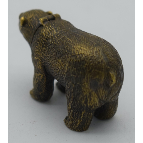 1028 - A VERY RARE VICTORIAN BRASS POLAR BEAR VESTA CASE. 71 grams. 6.75 cm x 2.25cm.