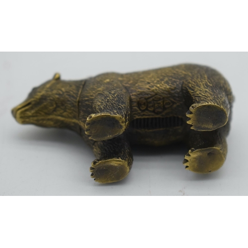 1028 - A VERY RARE VICTORIAN BRASS POLAR BEAR VESTA CASE. 71 grams. 6.75 cm x 2.25cm.