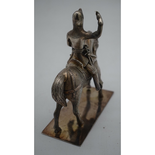 1041 - A FINE 19TH CENTURY ENGLISH WHITE METAL FIGURE OF A SOLDIER ON HORSEBACK. 707 grams. 12.5 cm x 11cm.