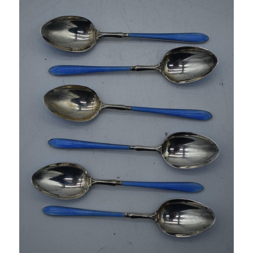 1056 - A SET OF SIX ART DECO SILVER AND ENAMEL COFFEE SPOONS. 81 grams. 10.5 cm long. (6)