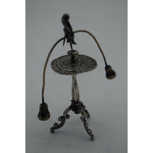 1058 - A RARE 18TH CENTURY CONTINENTAL SPINNING MALE TABLE TOY probably Dutch silver. 75 grams. 12 cm x 9.5... 