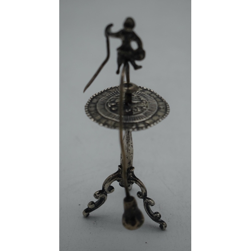 1058 - A RARE 18TH CENTURY CONTINENTAL SPINNING MALE TABLE TOY probably Dutch silver. 75 grams. 12 cm x 9.5... 