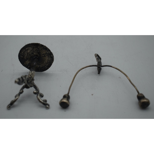 1058 - A RARE 18TH CENTURY CONTINENTAL SPINNING MALE TABLE TOY probably Dutch silver. 75 grams. 12 cm x 9.5... 