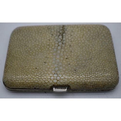 1062 - AN EARLY 20TH CENTURY ART DECO SILVER AND SHAGREEN CASE. 83 grams. 11cm x 8.25cm.