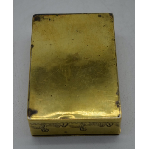 1068 - AN ANTIQUE BRASS SNUFF BOX. 73 grams. 8 cm x 5 cm.