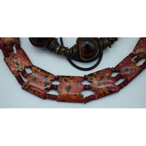 1083 - A MIDDLE EASTERN NECKLACE. 216 grams. 63 cm long.