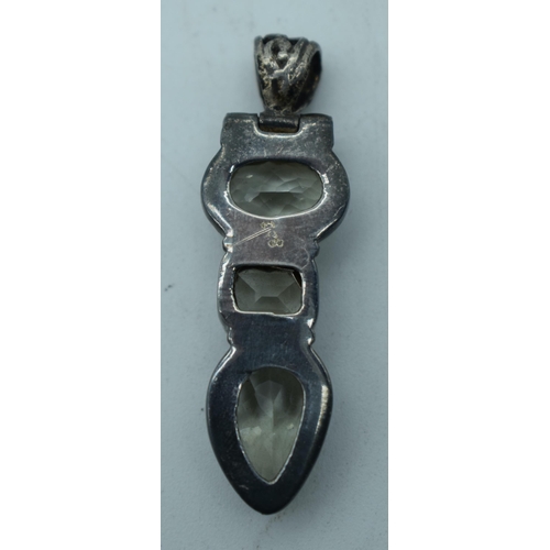 1099 - A SILVER GEM SET PENDANT. 15 grams. 5.5 cm x 1.75 cm.