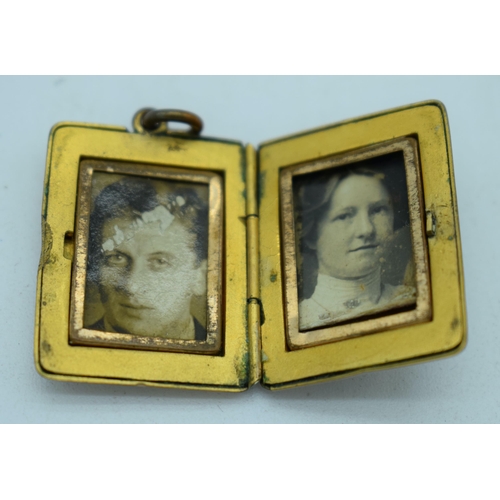 1105 - AN ANTIQUE YELLOW METAL PENDANT. 11 grams. 2.75 cm x 2.25cm.