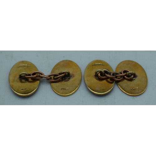 1109 - A PAIR OF 9CT GOLD MASONIC CUFFLINKS. 7 grams. 1.75 cm x 1 cm.