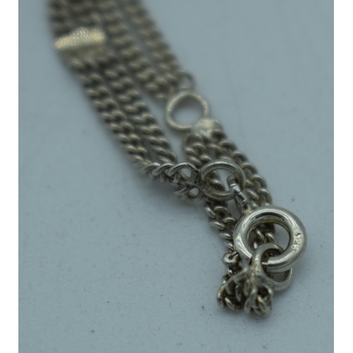 1117 - A SILVER NECKLACE. 14 grams. Chain 47 cm long, pendant 5.25cm x 3 cm.