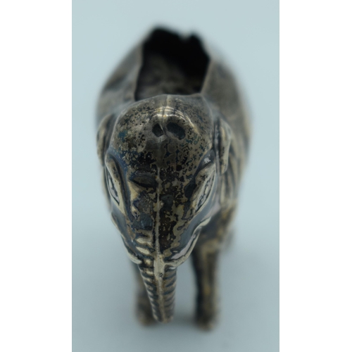 1136 - AN ANTIQUE SILVER ELEPHANT PIN CUSHION. 25 grams. 6.75 cm x 4.5 cm.