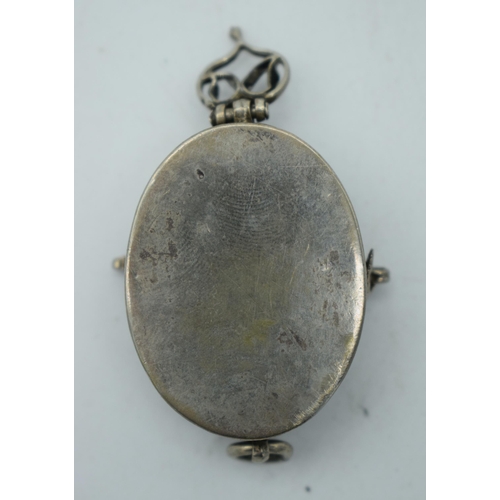 1141 - AN ISLAMIC WHITE METAL PENDANT. 15.5 grams. 4 cm x 3.5 cm.