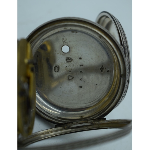 1164 - A VICTORIAN SILVER POCKET WATCH. London 1877. 120.4 grams. 5.5 cm diameter.