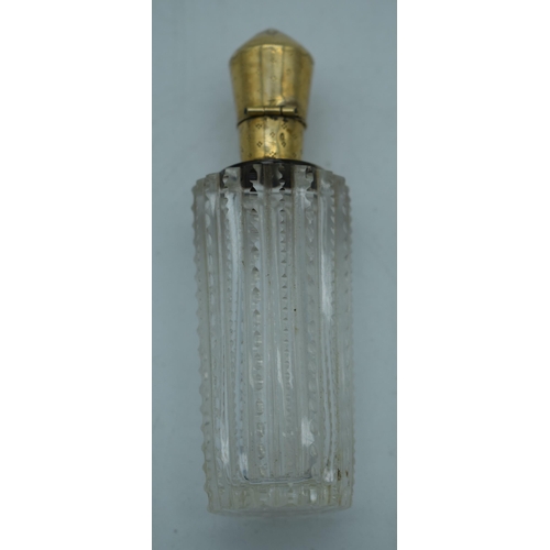 1175 - A 14CT GOLD AND GLASS SCENT BOTTLE. 43 grams. 8.75 cm x 2.75 cm.