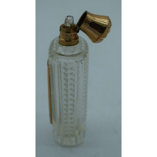 1177 - A 14CT GOLD AND GLASS SCENT BOTTLE. 49 grams. 8.75 cm x 2.75 cm.