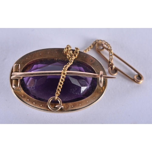 1183 - AN ANTIQUE YELLOW METAL AMETHYST AND PEARL BROOCH. 7 grams. 2.75 cm x 2 cm.