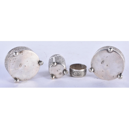 1187 - A PAIR OF 19TH CENTURY ISLAMIC SILVER SALTS and another. 117 grams. Largest 5.5 cm x 3 cm. (3)