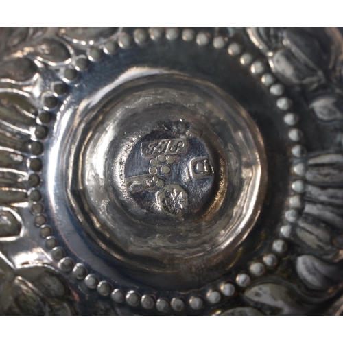 1197 - A CONTINENTAL SILVER REPOUSSE BOWL. 166 grams. 13.5 cm x 8 cm.