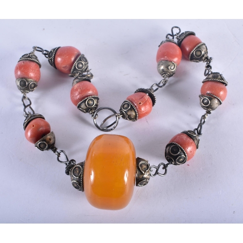 1271 - A Beaded Necklace.  Largest Bead 3.4cm, length 42cm, weight 85.84g