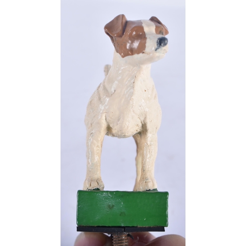 1275 - A Cold Painted Figure of a Terrier Dog.  8.5 cm x 7cm x 3 cm