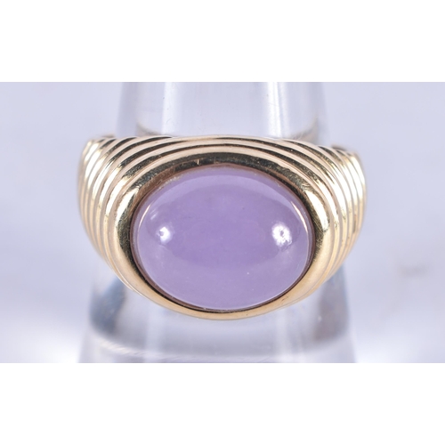 1300 - A 14 Carat Gold Ring set with a Lavender Jade Cabochon.  Size O, Stamped 14K, weight 5.6g