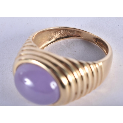 1300 - A 14 Carat Gold Ring set with a Lavender Jade Cabochon.  Size O, Stamped 14K, weight 5.6g