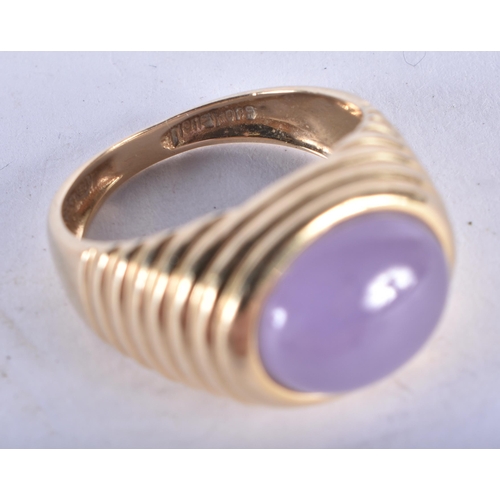 1300 - A 14 Carat Gold Ring set with a Lavender Jade Cabochon.  Size O, Stamped 14K, weight 5.6g