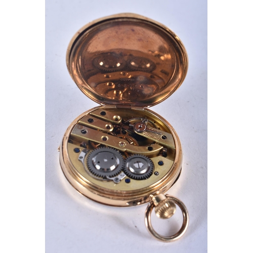 1308 - An 18 Carat Gold Cased Open Face Pocket Watch.  Stamped 18K, Dial 3.6 cm, weight 39.6g, running