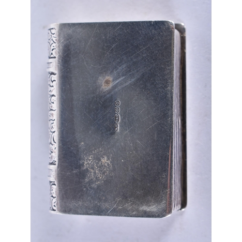 1309 - A Silver Pill Box in the form of a Book with Gilt lining.  Hallmarked London 1988, 3.5 cm x 2.5 cm x... 