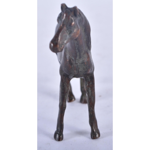 1316 - A Bronze Model of a Horse.  8.7cm x 7cm x 2.2 cm, weight 129g