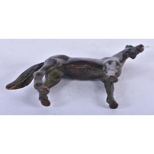 1316 - A Bronze Model of a Horse.  8.7cm x 7cm x 2.2 cm, weight 129g