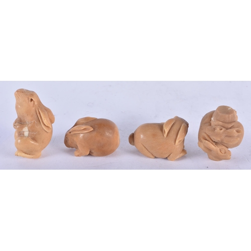 1317 - Four Nut Netsukes carved as Rabbits in various poses.  Largest 3.2 cm x 2.3 cm x 2.1cm, total weight... 