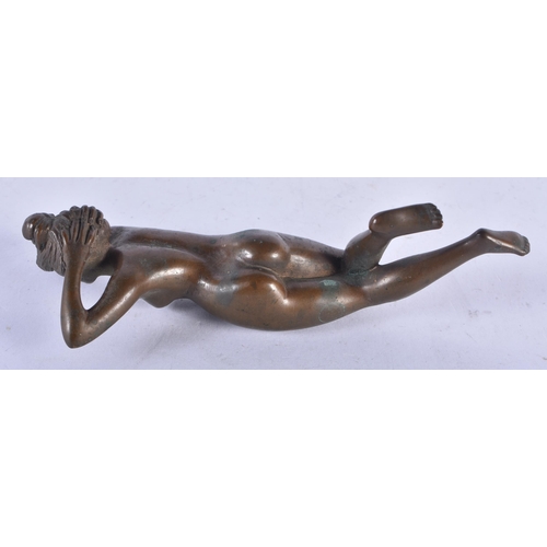 1318 - A Bronze Figure of a Reclining Nude.  14cm x 5.3 cm x 4.2 cm, weight 300g