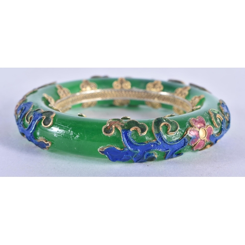 1319 - A Chinese Jade Bangle with Enamel Decoration.  Internal diameter 5.6 cm, weight 107.8g