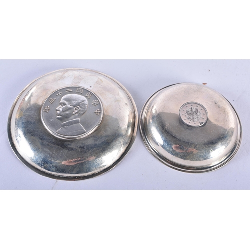 1329 - Two Silver Coin Dishes.  1 Stamped Silver.  Largest 8.7cm x 1cm, total weight 60.9g (2)