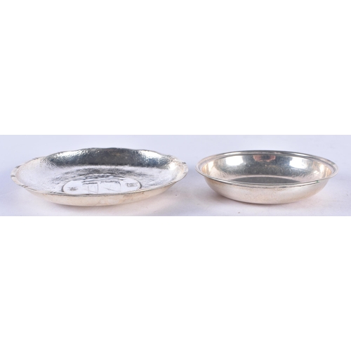 1329 - Two Silver Coin Dishes.  1 Stamped Silver.  Largest 8.7cm x 1cm, total weight 60.9g (2)