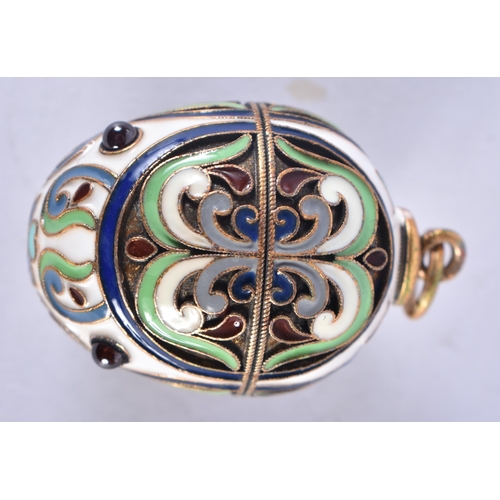 1332 - A Continental Silver Gilt and Enamel Egg Pendant.  Stamped 84, 3.2 cm x 2.1cm, weight 9.5g