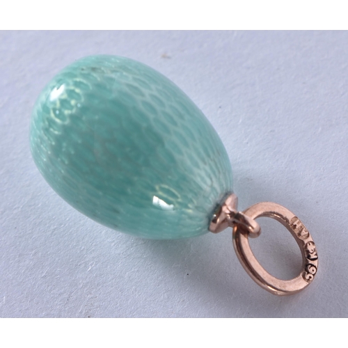 1333 - A Guilloche Enamel Egg Pendant with old Mounts.  Stamped 56, 1.9cm x 1.2 cm, weight 2.3g