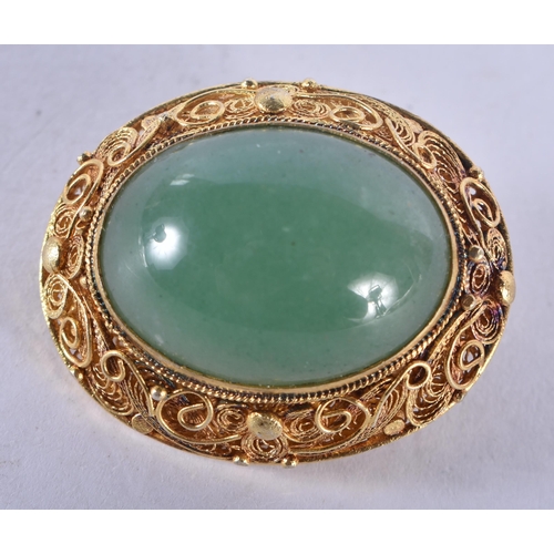 1344 - A Chinese Silver Gilt and Jade Brooch.  Stamped 925, 3 cm x 2.4cm, weight 9.8g