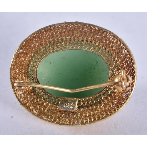 1344 - A Chinese Silver Gilt and Jade Brooch.  Stamped 925, 3 cm x 2.4cm, weight 9.8g