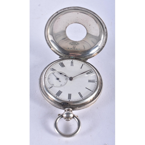 1350 - A Fine Silver Cased Half Hunter Pocket Watch.  Case Stamped Fine Silver.  4.6 cm diameter, weight 78... 